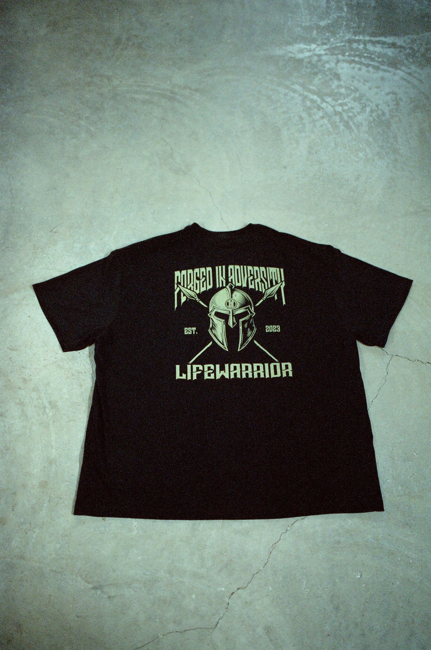 'FORGED IN ADVERSITY' OVERSIZED TEE